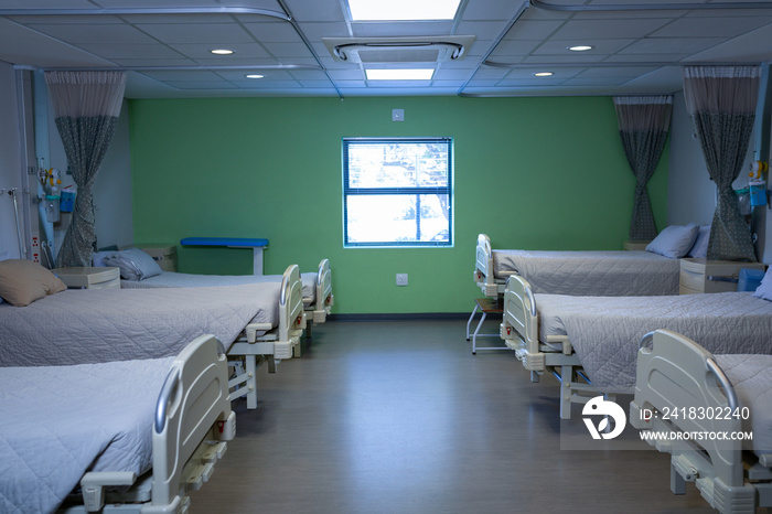 Row of empty hospital beds