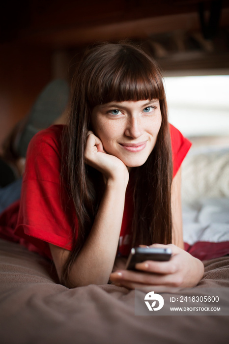 Portrait of young woman smiling