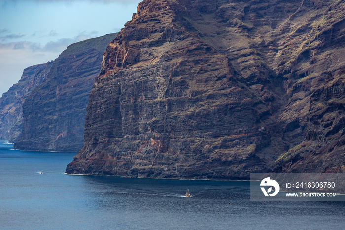 Landscape of Los Gigantes cliffs in Tenerife seen from a beach. Canary Islands, Spain