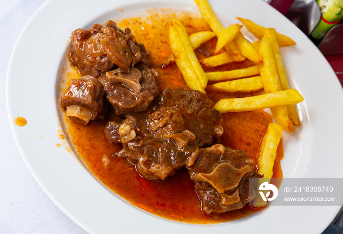 Oxtail in sauce - Rabo de toro. Spanish dish. High quality photo