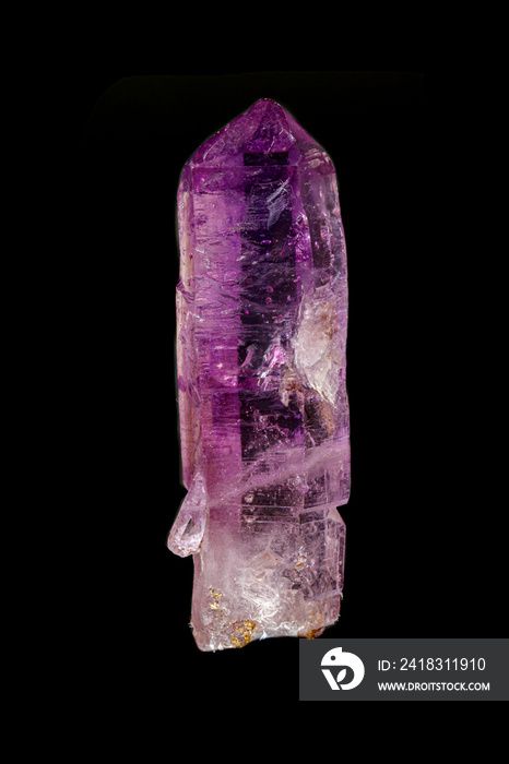 macro mineral amethyst stone on a black background