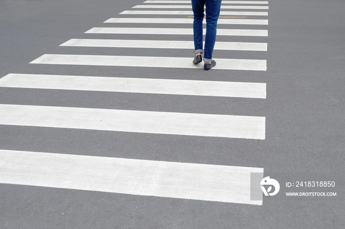 One walking on the zebra crosswalk