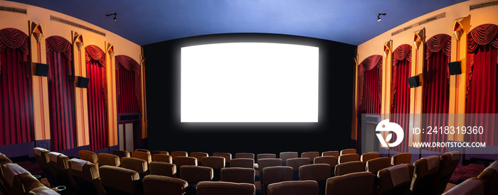 Cinema theater screen in front of seat rows in movie theater showing white screen projected from cin