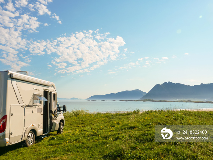 Camper van on sea shore, Lofoten Norway