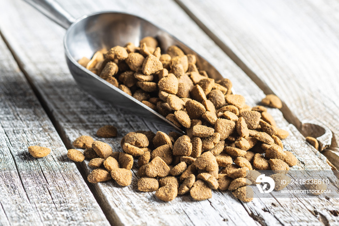 Dried kibble pet food. Heart shape dried animal food.