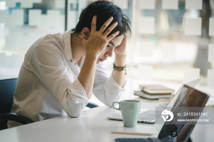 Confused businessman with stressed and worried about  working mistake and problems.