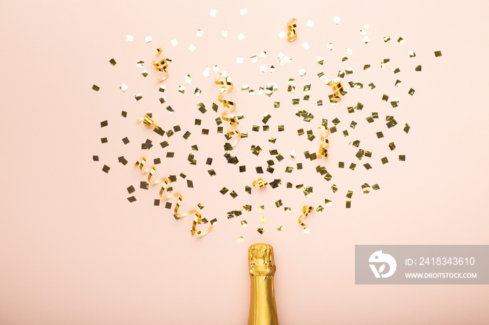 Creative flat lay champagne bottle with star confetti on pink