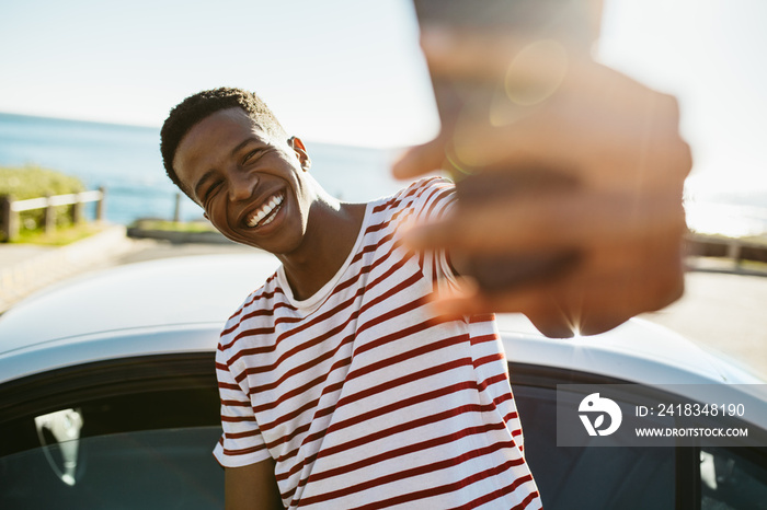 African guy making a selfie outdoors