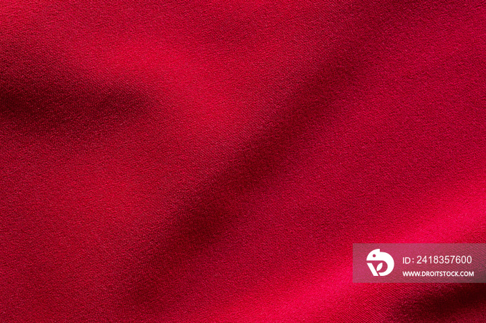 Red fabric cloth texture background close up