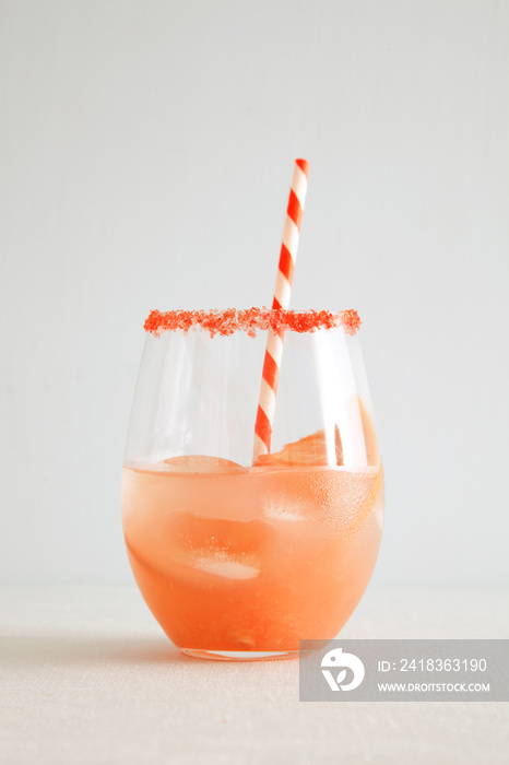 Close-up of grapefruit juice against white background