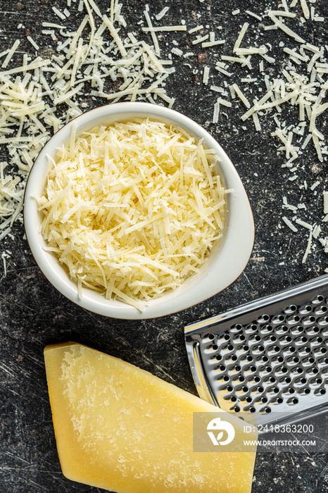 Tasty grated cheese. Parmesan cheese.