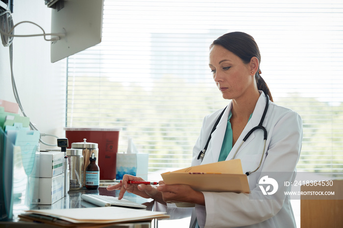 Doctor working on computer