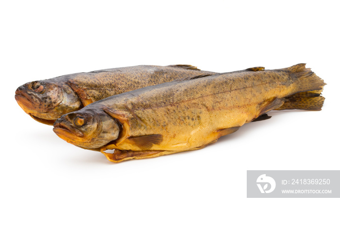 Smoked trout in front of a white background.