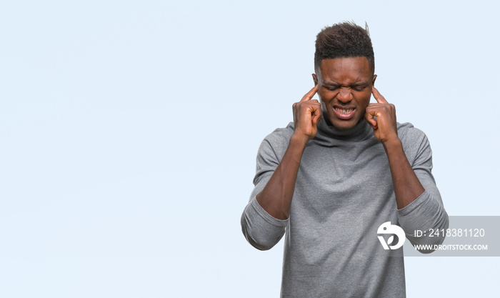 Young african american man over isolated background covering ears with fingers with annoyed expressi