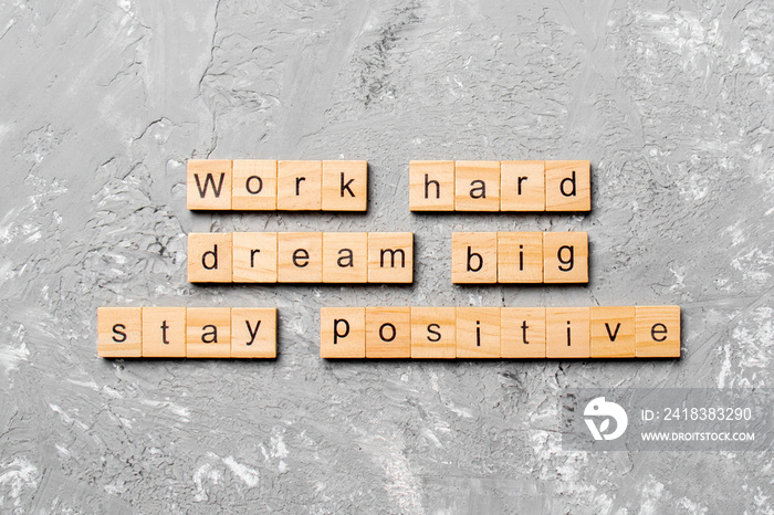 Work hard dream big stay positive word written on wood block. Work hard dream big stay positive text