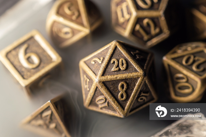 Close-up image of a set of copper rpg dice