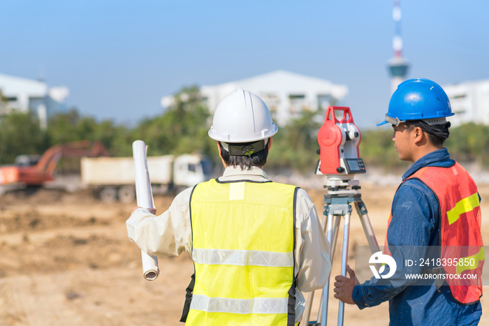 Construction engineer and foreman worker checking construction site for new Infrastructure construct