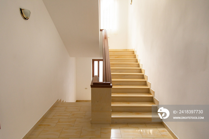 the hotel hall with stairs