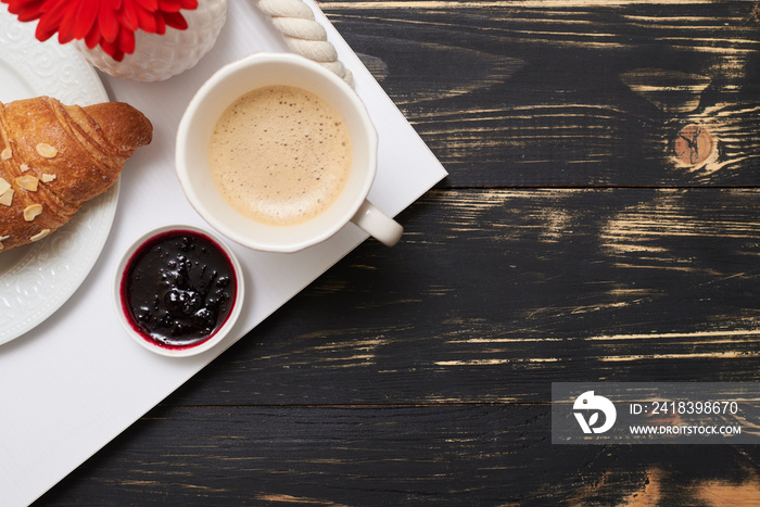 Flat lay of french breakfast with croissant