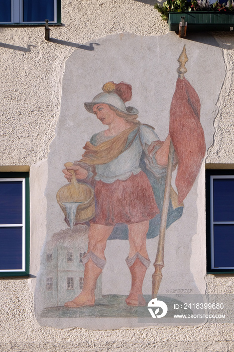 Saint Florian painting on the facade of the house in St. Gilgen on Wolfgang See lake, Austria