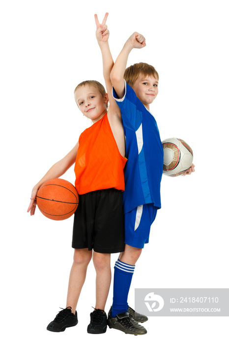 Two boys - a basketball player and footballer with balls