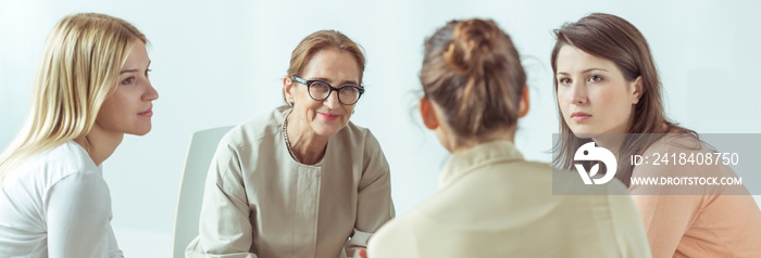 Female psychologist helping her patients