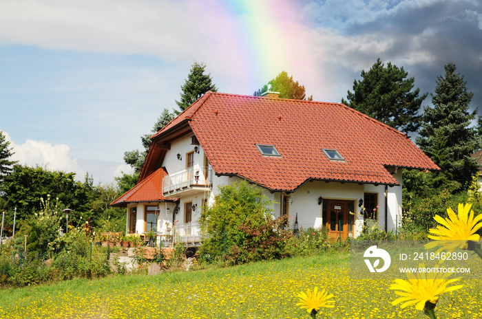 Am Ende des Regenbogens steht ein Haus