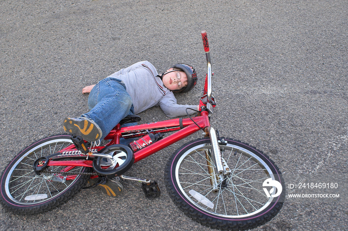 A young boy who crashed his bike.