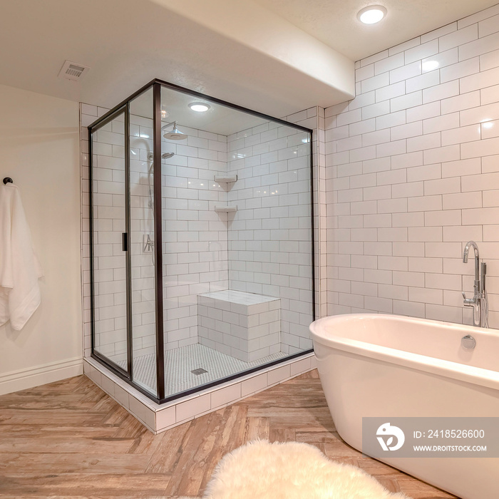 Square frame Contemporary bathroom with free standing bath tub