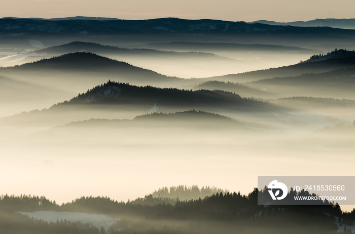 Misty mountains landscape in the morning, Poland