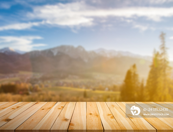 Raw pine planks on bokeh background