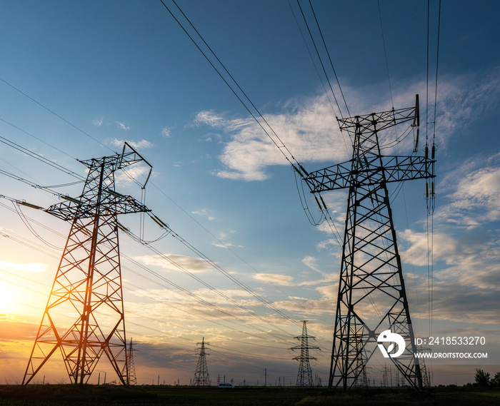 High-voltage power lines on the background of a beautiful cloudy sky