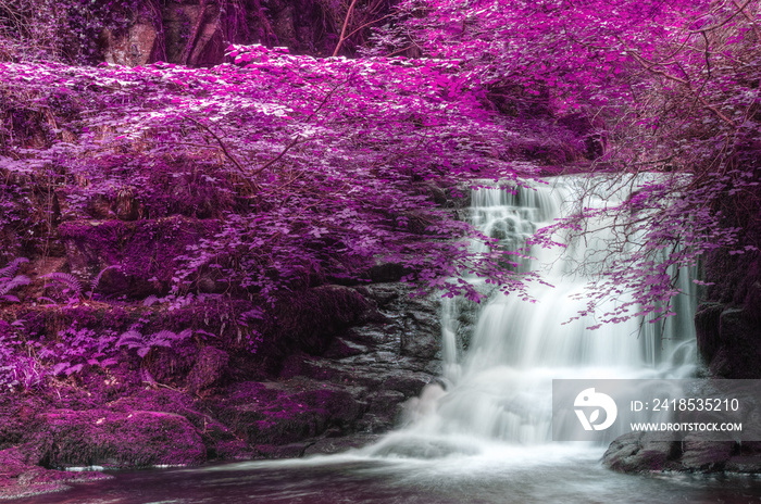 Beautiful alternate colored surreal waterfall landscape