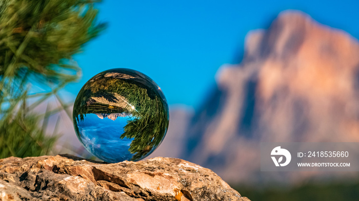 Crystal ball alpine evening landscape shot at the famous Seiser Alm, South Tyrol, Italy