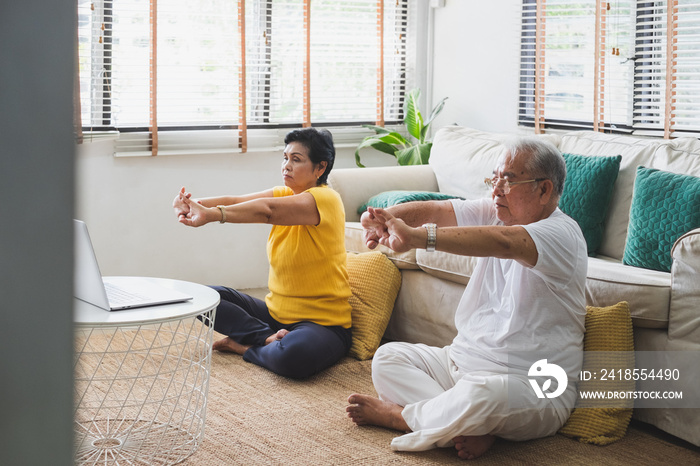 Asian old senior workout exercise and doing yoga at home