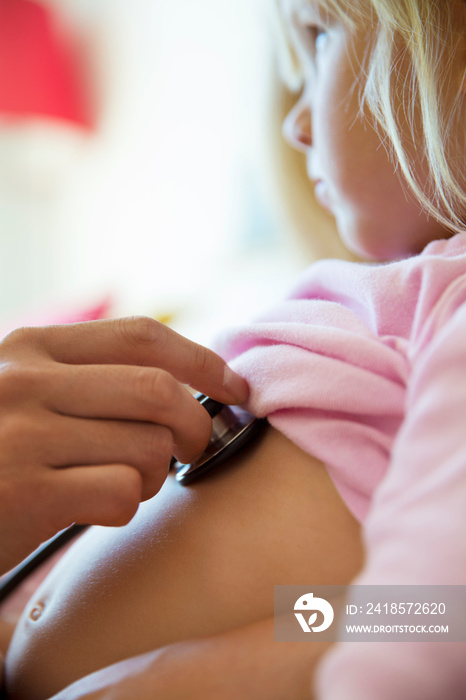 Girl being examined