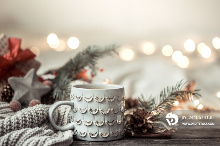 Festive background with Cup on wooden background with lights.