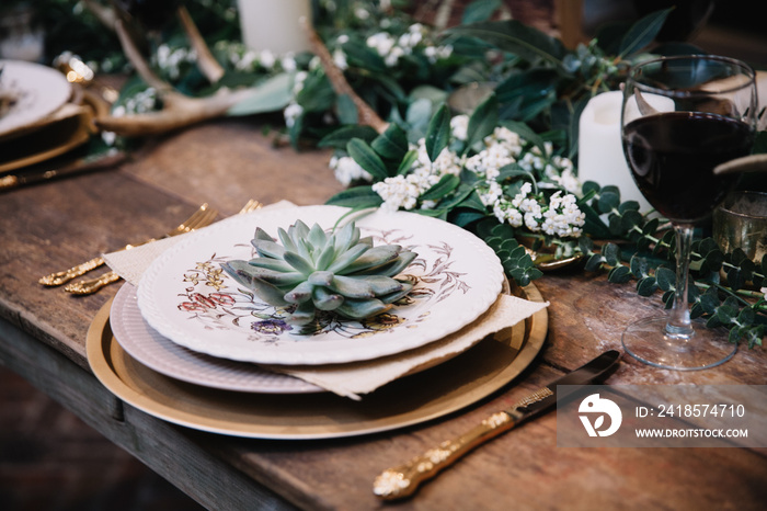 A table setting for a boho style event with rustic touches