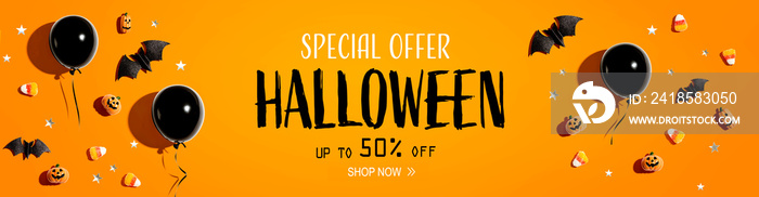 Halloween sale banner with black balloons and Halloween decorations