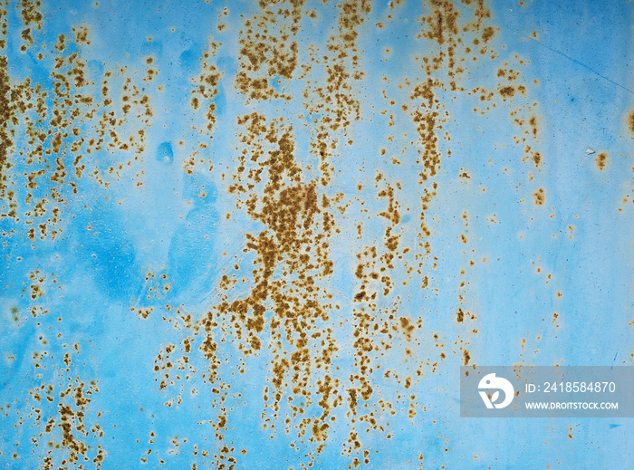 iron texture of rusty sheet with remains of blue paint. Metal rusty