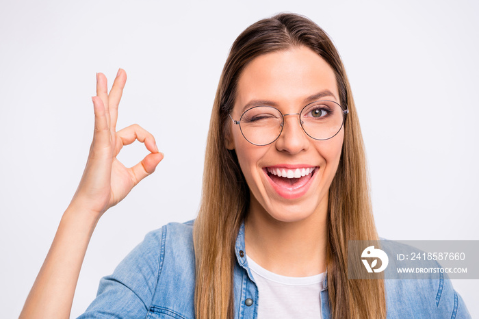 Closeup photo of excited nice pretty lovely teen lady giving okey signal isolated grey background