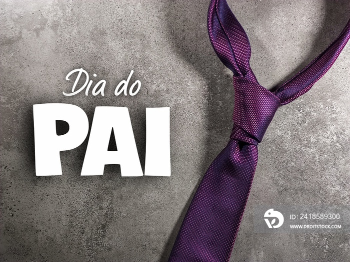 Dia do Pai. fathers Day in portuguese language with necktie on Gray background.Greetings and presen