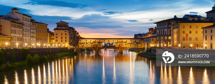 Ponte Vecchio - the bridge-market in the center of Florence, Tuscany, Italy at dusk