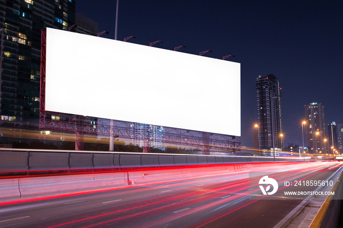 Double exposure of blank billboard on blur light trails, street and urban in the night - can adverti