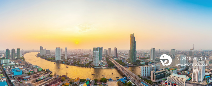 Beautiful view of Bangkok city with Chaopraya river at sunset. Panorama photo.