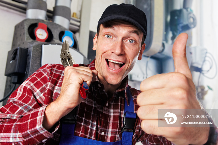 plumber with multigrip pliers and thumb up