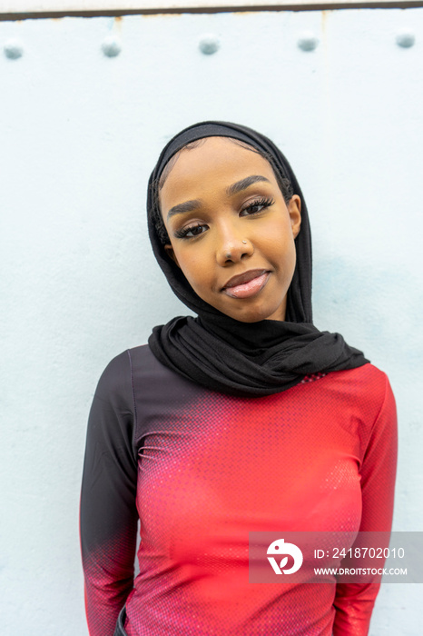 Portrait of young woman wearing hijab