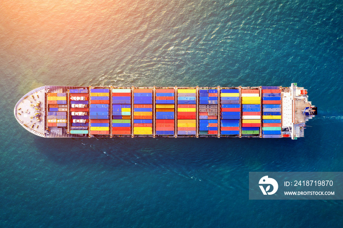 Aerial view of container cargo ship in sea.