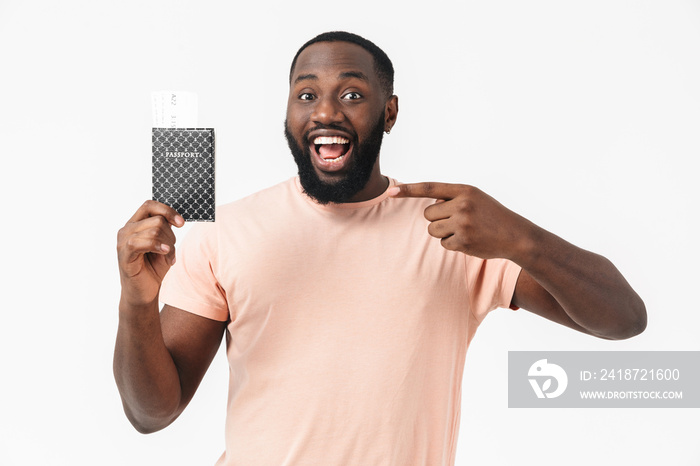 Portrait of a happy casual african man standing isolated