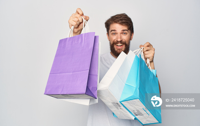 young man with shopping bags